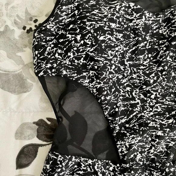 Rare LIKE NEW Lululemon cutout one piece swim suit with tie detail in back. - Picture 3 of 5